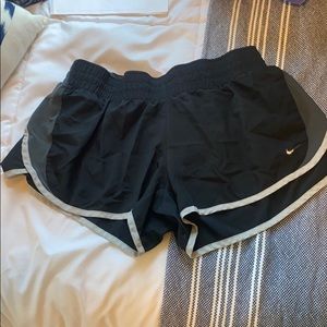 Black and grey Nike running shorts